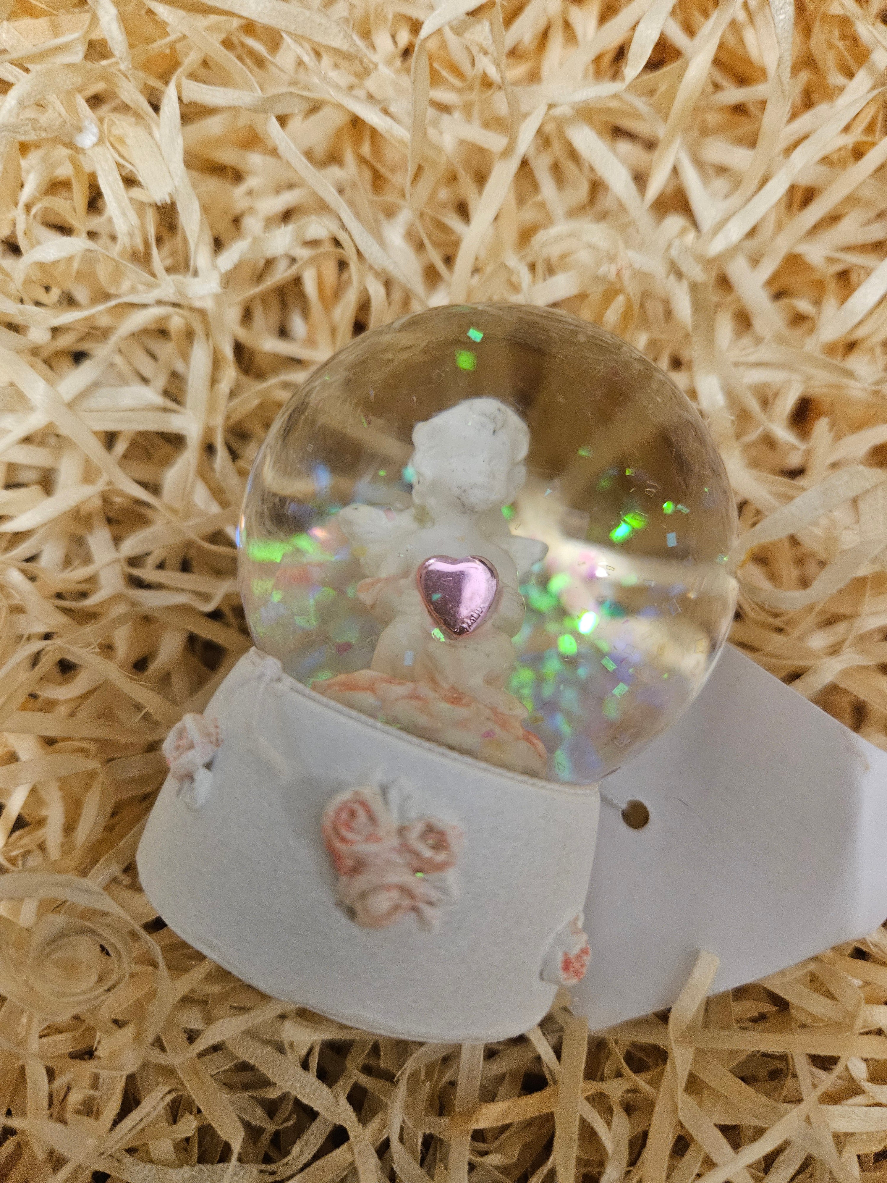 Cherub in Snow Globe
